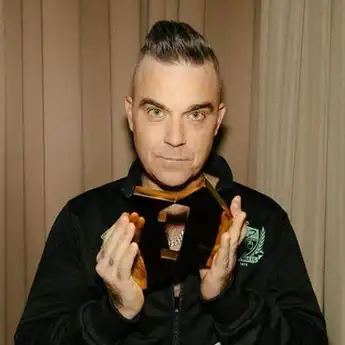 Robbie Williams Ungkap Alasan Menolak Tawaran Jadi Vokalis Queen