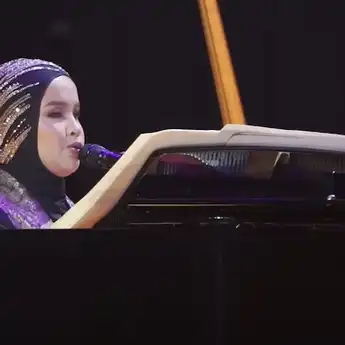 Lirik dan Terjemahan Lagu 'Sorry Seems To Be The Hardest Word' 