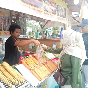 Pesona QRIS BRI Di Pasar Wadai Ramadan Banjarmasin