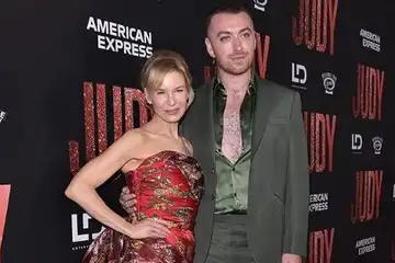 Ren&eacute;e Zellweger dan Sam Smith saat hadir di acara pemutaran perdana film 'Judy'