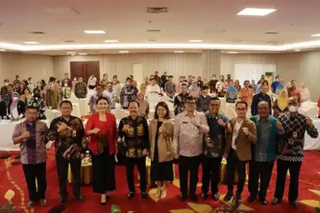 Untung Santoso (dua dari kiri) pada acara Rapat Pleno TPAKD Semester II Tahun 2022 dan Penyusunan Program TPAKD se-Sumut Tahun 2023 serta Bussiness Matching UMKM, di Tiara Convention Center, Jalan Imam Bonjol, Medan, Kamis (01/12).