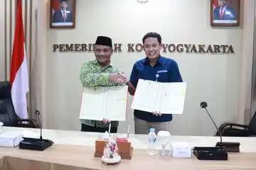 Kepala BPJS Kesehatan Cabang Yogyakarta bersama Pj. Walikota Yogyakarta.