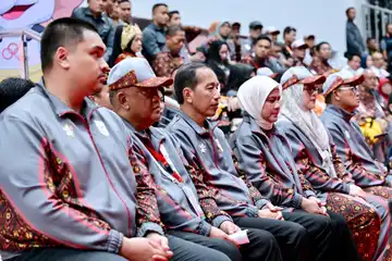 Pj Gubernur Sumsel Elen Setiadi, S.H., M.S.E, didampingi oleh Ketua Tim Penggerak (TP) PKK Sumsel, Melza Elen Setiadi, menghadiri pembukaan Pekan Olahraga Nasional (PON) XXI Aceh-Sumut 2024.