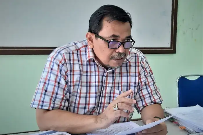Dr. Bastian Lubis, S.E., M.M., CFM