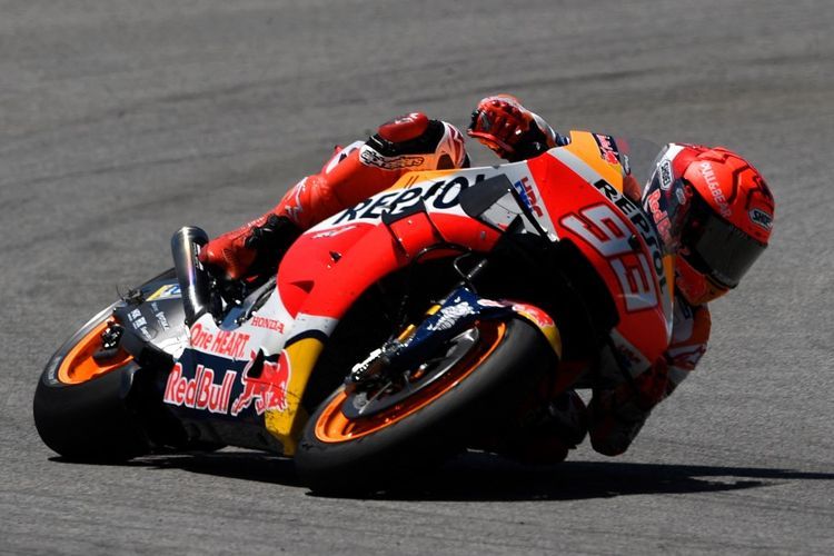 Marc Marquez saat balapan pada MotoGP Spanyol 2021. (Photo by PIERRE-PHILIPPE MARCOU / AFP)(PIERRE-PHILIPPE MARCOU)  
