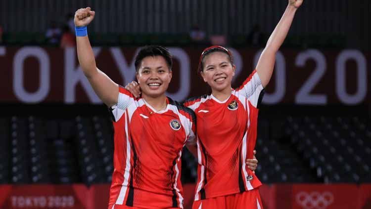 Pebulu tangkis ganda putri Indonesia Greysia Pollii/Apriyani Rahayu melakukan selebrasi setelah mengalahkan lawannya ganda putri China Chen Qing Chen/Jia Yi Fan dalam final Olimpiade Tokyo 2020 di Musashino Forest Sport Plaza, Tokyo, Jepang, Senin (2/8/2021). Greysia Pollii/Apriyani Rahayu berhasil meraih medal emasi setelah mengalahkan Chen/Jia Yi Fan dua set langsung. 21-19 dan 21-15.