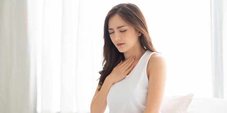 ilustrasi penderita asam lambung.(iStockphoto/eggeeggjiew) 