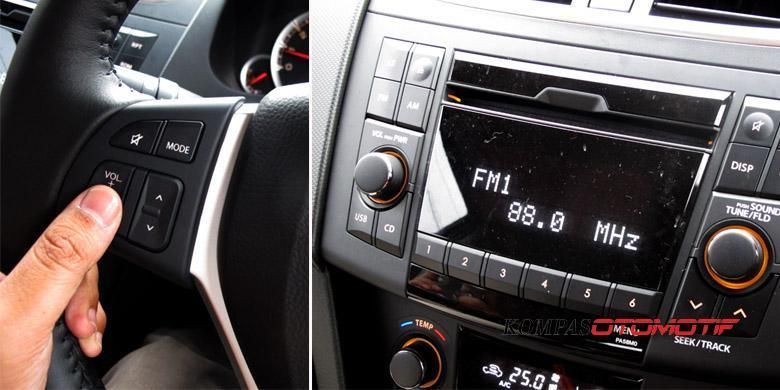 Head Unit pada Suzuki Swift, bisa diganti produk aftermarket termasuk fungsi tombol di setir.(Donny Apriliananda) 