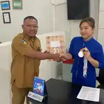 Angelina Runtu, Pekerja BRI Unit Batui Raih Prestasi dalam Porkab V Banggai 2025